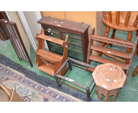 A stained pine wall mounted cabinet; a small pine wall shelf; a small pine wall cabinet; a four fold modesty screen; a firesc