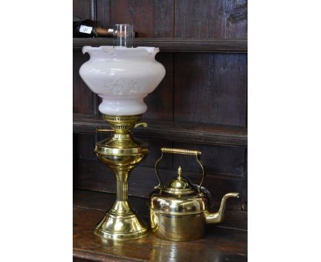 A brass oil lamp, Duplex twin burner; a brass kettle (2)