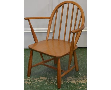 An Ercol child's spindle back chair.