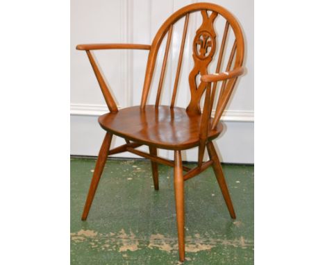 An Ercol Windsor carver chair.