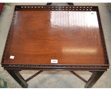 A Chippendale style mahogany lamp or silver table 