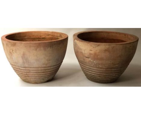 PLANTERS, a pair, vintage handmade terracotta of conical form with ring turnings, 58cm Diam x 41cm H. (2)
