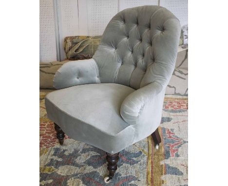 ARMCHAIR, Victorian mahogany in Designers Guild buttoned green velvet on ceramic castors.