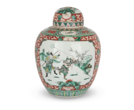 A Chinese famille verte jar and coverQing dynasty, 19th centuryPainted with two panels depicting two warriors in a garden lan