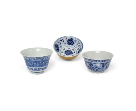 Three Chinese blue and white cups and bowlsQing dynasty, Kangxi periodComprising of a small bowl with cafe au lait glaze to t
