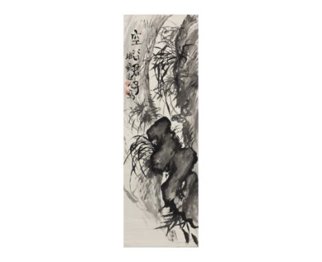 Tomioka Tessai (1837 – 1924)A Japanese painting, ink on paper, mounted as hanging scroll, depicting orchid within the canyon,