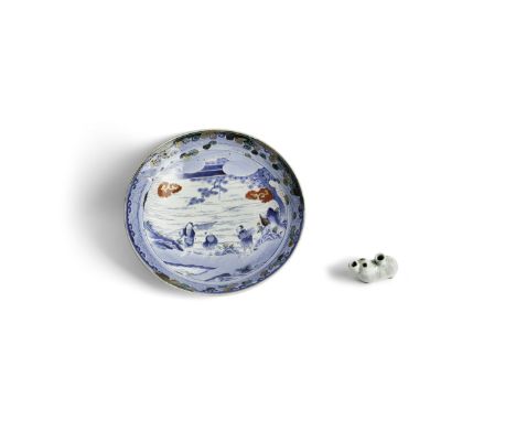 A large Japanese Arita dish and a Japanese Hirado water dropperMeiji periodThe first painted with farmers by a river shore, l