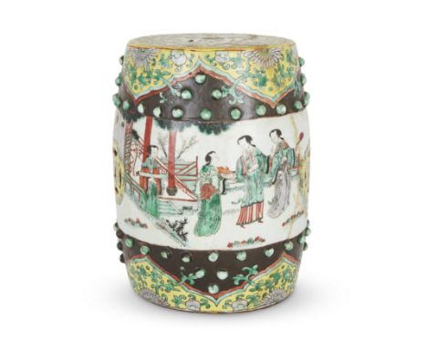 A small Chinese black and yellow ground famille verte garden seatLate Qing dynastyDecorated around the mid-section with a sch