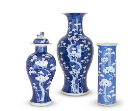 Three Chinese blue and white 'prunus' vasesQing dynasty, 19th century, apocryphal Kangxi markComprising: a baluster vase with