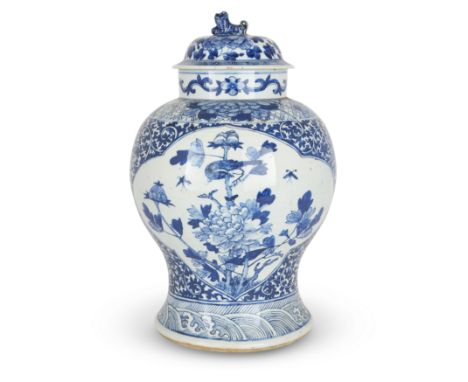 A large Chinese blue and white baluster jar and coverQing dynasty, mid-19th centuryDecorated to the body with two lobed panel