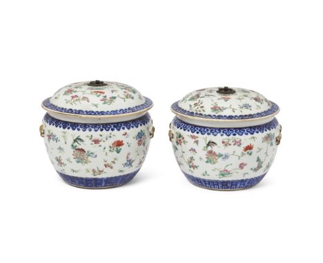 A pair of Chinese famille rose jars and coversQing dynasty, late 19th centuryPainted to the domed covers and bodies with scat