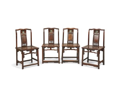 A set of four Chinese hongmu chairsLate Qing dynastyeach with shaped top rail above central curved splat set with a marble pa