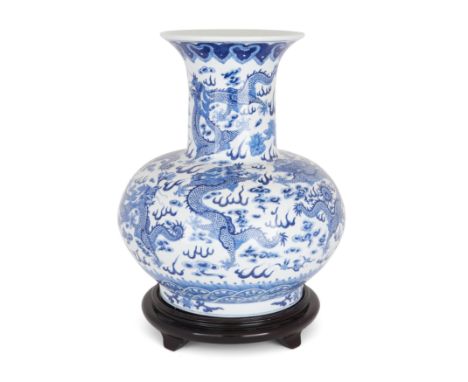 A large Chinese blue and white dragon vase mounted as a lamp20th century, apocryphal Qianlong markThe sturdily potted vase wi