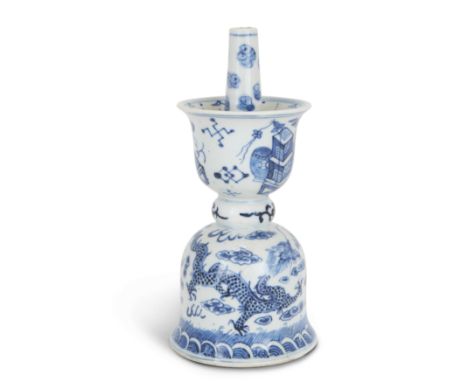 A Chinese blue and white candlestick holderQing dynasty, 19th centuryThe upper section painted with 'precious vessels', the l