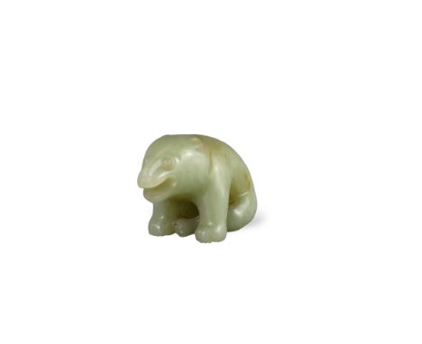 A Celadon Jade Bear, 19/20th century,  finely carved, the seated beast with his mouth open to growl, the softly polished ston