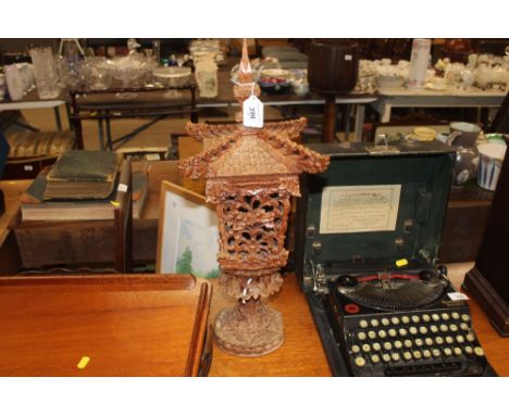 A mid-20th Century Oriental carved hardwood table lamp