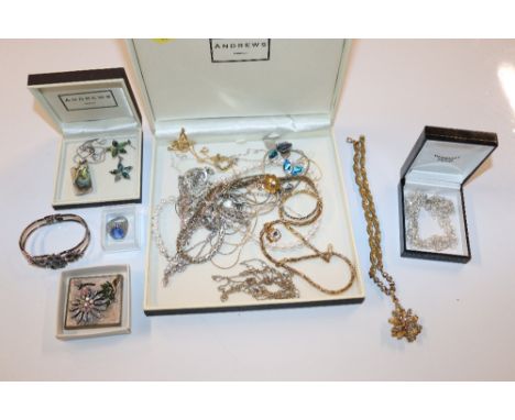 A box of assorted costume jewellery to include necklaces, dress ring, bangle etc.