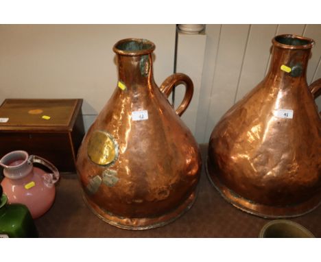 A large antique copper jug of haystack shape the brass plaque inscribed R. Bent &amp; Co.