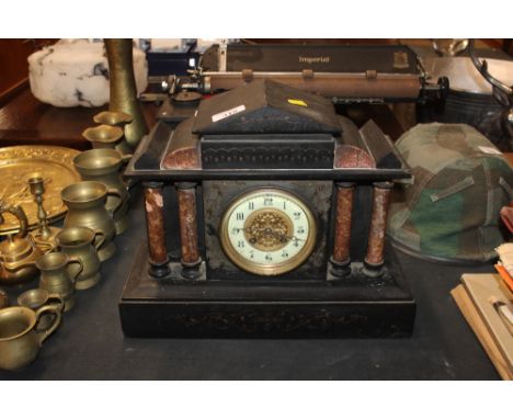 A Victorian marble cased mantel clock 