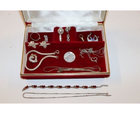 A box containing various Sterling silver crosses, locket, bangle etc. and other jewellery 