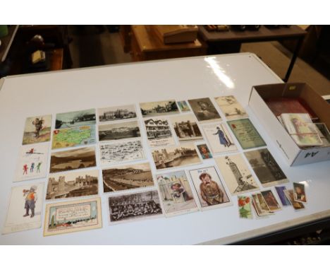 A box of various post-cards and Mrs Beeton's cookery book