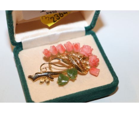 A gilt metal coral and jade set brooch 