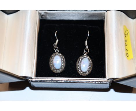 A pair of Sterling silver opal and marcasite set ear-rings