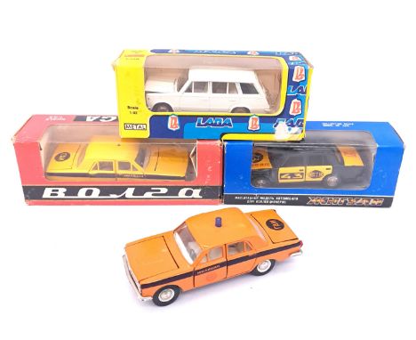 Russian boxed and unboxed 1:43 scale diecast group to include unboxed Moskovitch -Orange Volga GAZ Police Car, boxed a Volga 