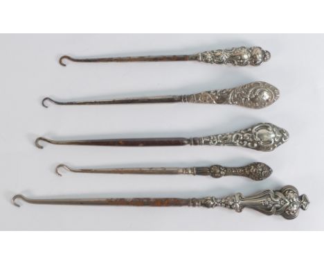 Five x unusual silver handled button hooks, 4 in good overall used condition, the 5th has some minor denting, all hallmarks r