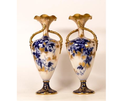 A Pair of Carltonware Wiltshaw &amp; Robinson Ivory Twin Handled Baluster Vases in the Catalpa Pattern, flow blue ground to b