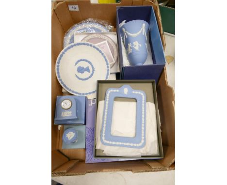 Boxed Wedgwood Jasperware items to include Large Dancing Hours Vase, Picture Frame, Mantle Clock, Commemorative Plates, talle