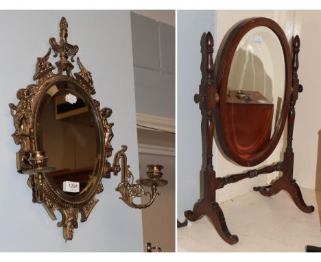 A brass twin-light girandole and a dressing mirror (2)