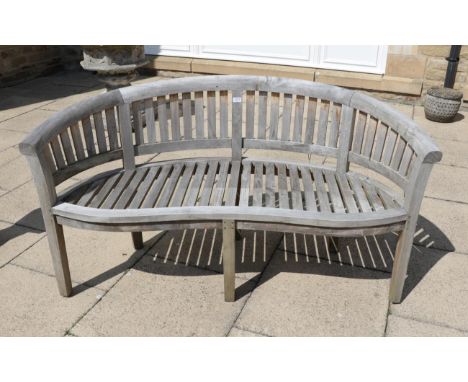 A curved garden bench