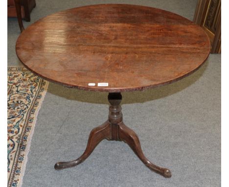 A George III oak tilt-top tripod table