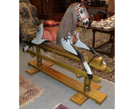An Early 20th Century dapple grey rocking horse