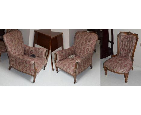 A pair of inlaid mahogany Edwardian upholstered armchairs, together with a similarly upholstered mahogany framed nursing chai