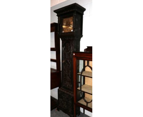 A carved oak thirty hour longcase clock, square brass dial signal on a silvered arched plaque. Will Porthouse, Penrith 1757 l