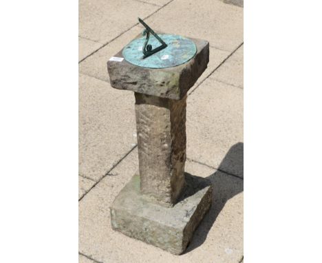 A sundial on square section stone 