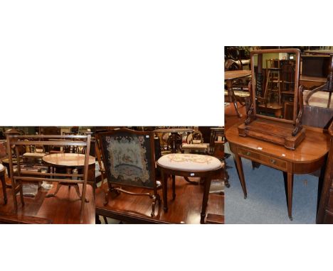 An Edwardian mahogany single drawer side table, a Victorian mahogany toilet mirror, a towel rail, a stool and a fire screen (