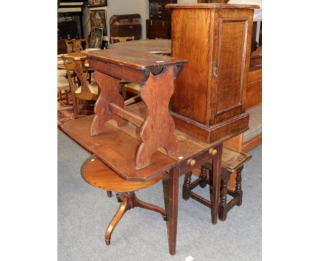 An oak joint stool; another stool; two tripod tables; an oak drop leaf table; two chairs; and an oak pot cupboard (8)