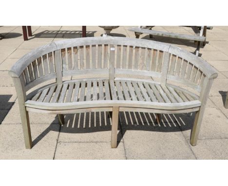 A curved garden bench