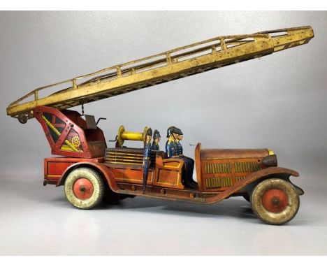 Vintage toys: An early 20th century German tin-plate fire engine with clockwork mechanism, approx 45cm in length (A/F)