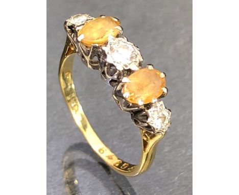 18ct Gold ring set with Oval faceted Citrines and a trio of platinum set Diamonds size 'N' 