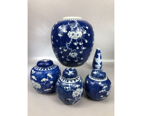 Collection of four Chinese blue and white prunus ginger jars, three with lids, two concentric ring marks to base of three, fo