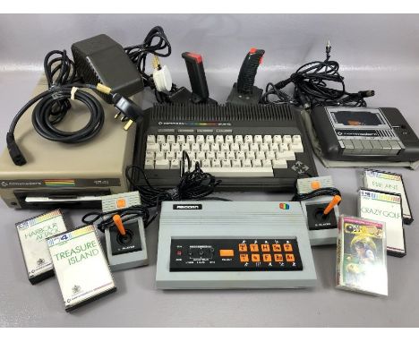 Vintage games consoles: Commodore plus/4 computer keyboard, 1541 disk drive, Datassette, joysticks etc, Sprint 128 Commodore 