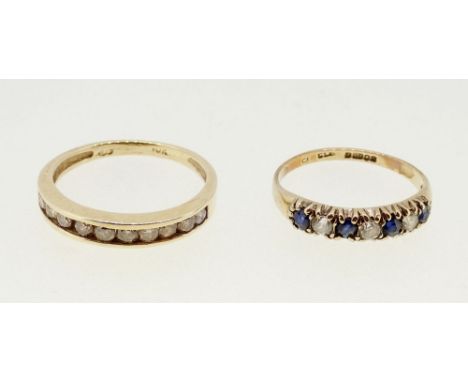 A 10k gold ring channel set diamonds, size M, 2g and a 9 carat gold ring set blue and white stones, size K, 1.1g 