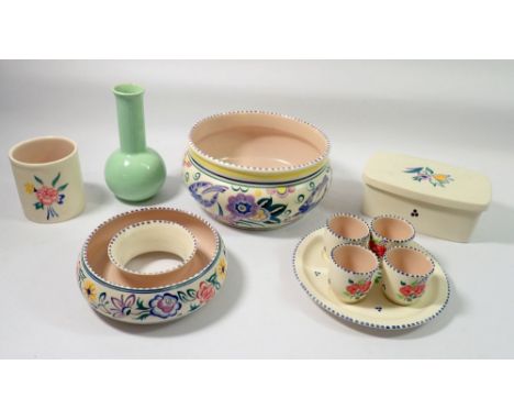 A Poole group of china including butter dish, egg cups, posy ring etc. 