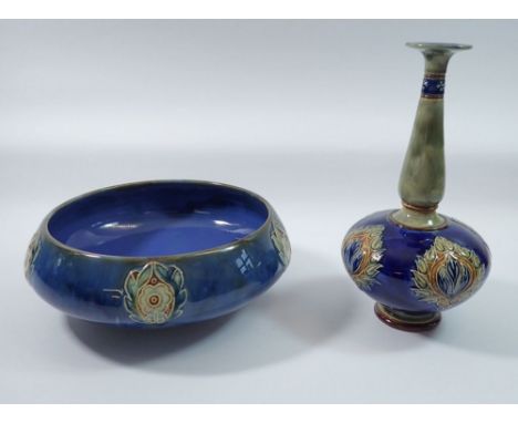 A Royal Doulton stoneware bowl with floral motifs on a blue ground and a similar long necked vase, signed HB, 25cm tall 