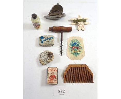 A box of small collectables including snuff box, scent bottle, corkscrew etc. 