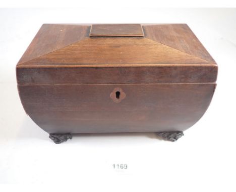 A 19th century rosewood tea caddy of sarcophagus form with metal foliate bracket feet, 22.5cm wide 